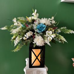 Bella's Floral & Designs - What a creation from Lisa. The touch of blue for the loss of the son was just inspired