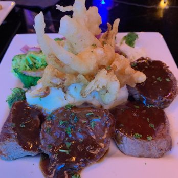 Suite Restaurant / Lounge - Main course-Filet Mignon w/ mash potatoes and onion tempura on top - Bars Near Me - Bellevue, Washington