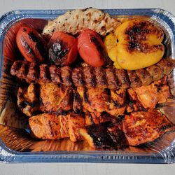 Tehran Market - Beef, chicken thigh, and salmon kabobs