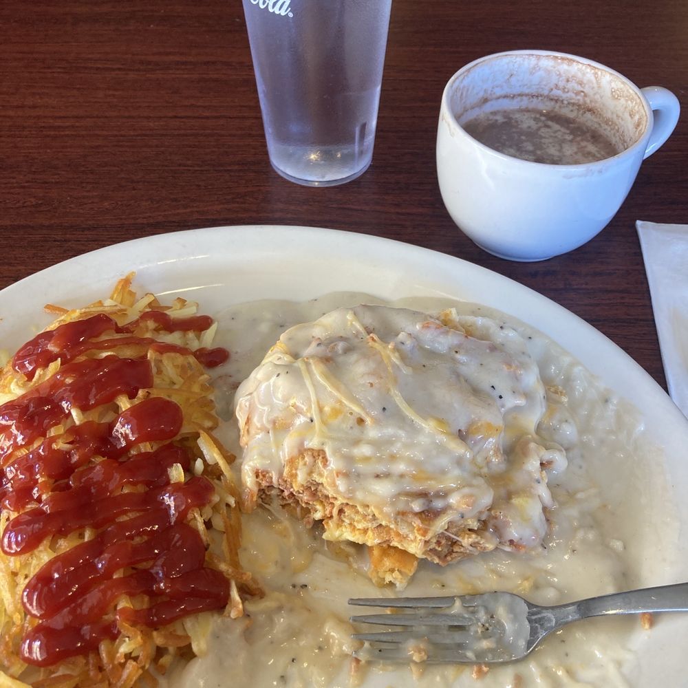 Biscuits and chorizo gravy with hash browns. Water. Hot chocolate. Biscuits and chorizo gravy with hash browns. Water. Hot chocolate.