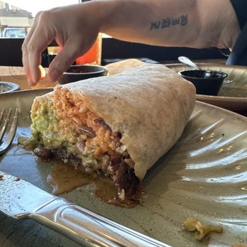 Sobremesa Restaurant & Brewery - Sunday Burrito with shredded beef, guacamole, queso, and green chili - Brewpubs Near Me - Albuquerque, New Mexico