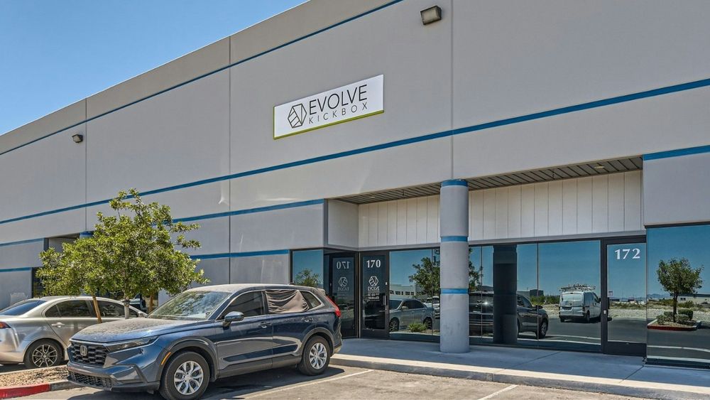 EVOLVE Kickbox & Fitness Logo