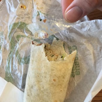 Taco Bell - Piece of scotch tape in my burrito, it's clear but I'm holding it. - Fast Food Near Me - Orlando, Florida