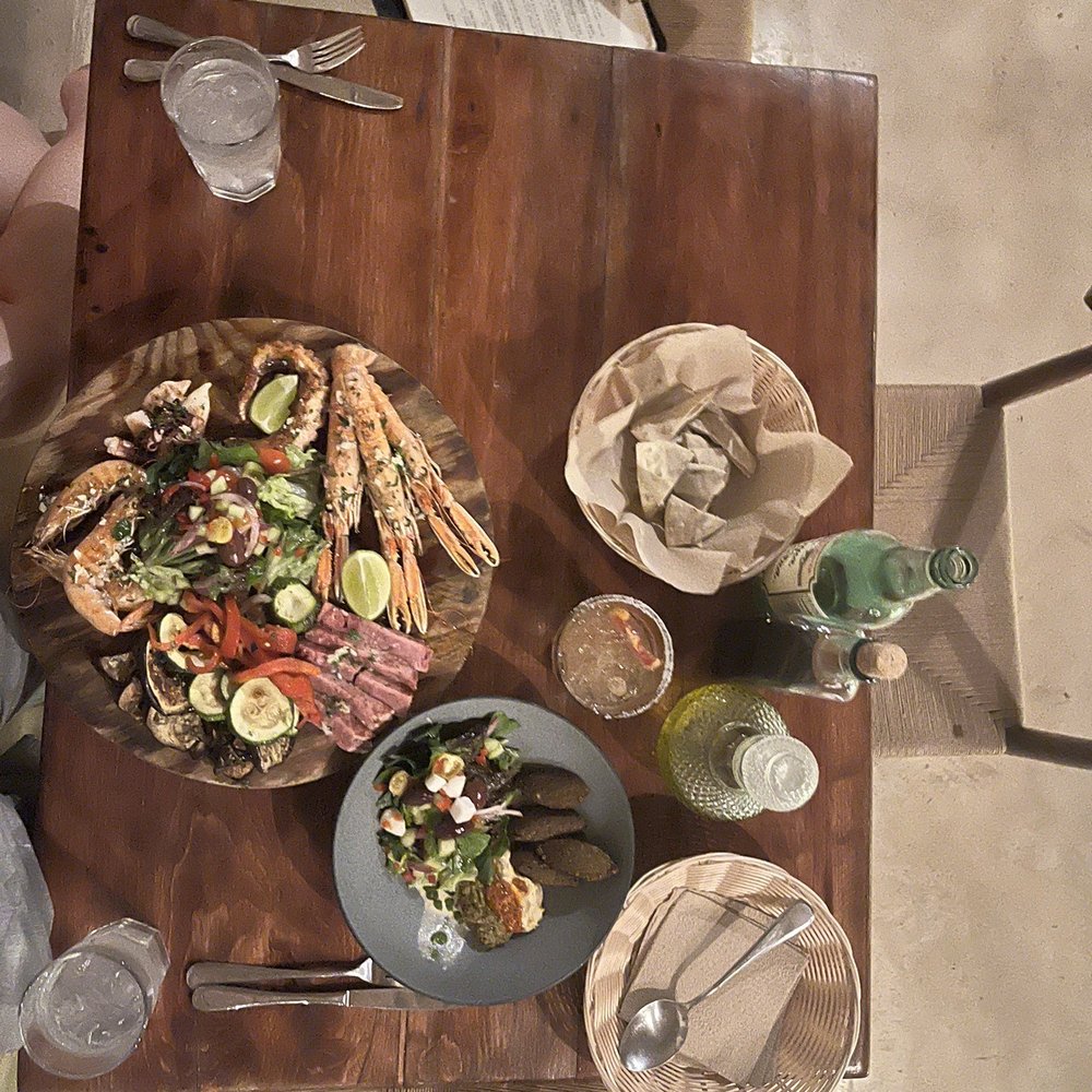 La Nave - Just getting started with a falafel Hummus Salad and a Seafood Platter. - Pizza Near Me - Tulum, ROO La Nave - Just getting started with a falafel Hummus Salad and a Seafood Platter. - Pizza Near Me - Tulum, ROO