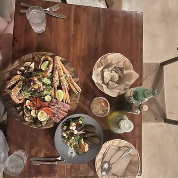 La Nave - Just getting started with a falafel Hummus Salad and a Seafood Platter. - Pizza Near Me - Tulum, ROO