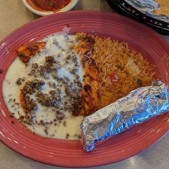 El Jinete - Chorizo polo/chicken covered in cheese sauce with rice and beans - Mexican Near Me - Fairfax, Ohio El Jinete - Chorizo polo/chicken covered in cheese sauce with rice and beans - Mexican Near Me - Fairfax, Ohio
