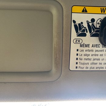 Chevron - a warning sign on the back of a car - Gas Stations Near Me - Riverside, California