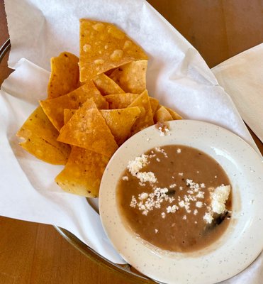 Photo of El Rincon Restaurant - San Ysidro, CA, US. Chips and beans