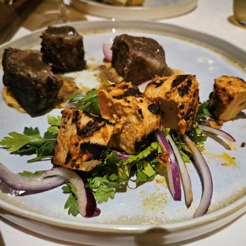 Habibi - The Slow-cooked Short Ribs in the back which was perfect! Wasn't a fan of the Chicken Breast Kebab. - Lebanese Near Me - Cancún, ROO Habibi - The Slow-cooked Short Ribs in the back which was perfect! Wasn't a fan of the Chicken Breast Kebab. - Lebanese Near Me - Cancún, ROO