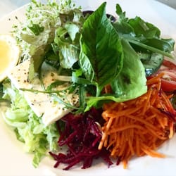 Pilgrims - Salad with rice, tabouli, lettuce, beetroot, carrot, tomato, cucumber, olives, feta, hummus and extra virgin oil.