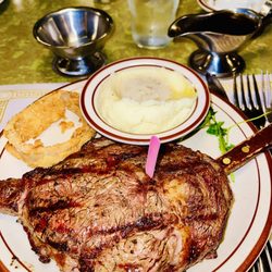 Johnny's Cafe - 13 ounce ribeye steak medium rare with cowboy mashed potatoes