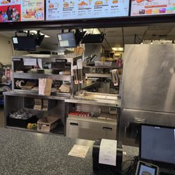 Burger King - No one was there except the cooks in the back. The cooks came around to deliver my food.