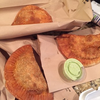 Copper Spoon - Empanadas: Beef on the left. Chicken on the right, and Guava and Cheese is the smaller one up top. - Food Trucks Near Me