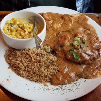 Buzzard Billy's - Chicken shrimp czarini with dirty rice and mock chow (corn).  Excellent sauce and super tasty corn. - American Near Me - La Crosse, Wisconsin
