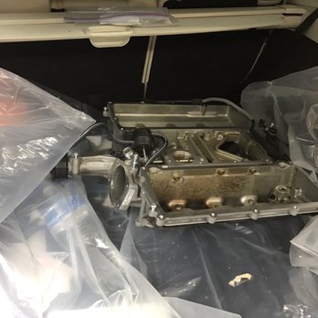 Absolute on Hoover - Engine upper head in the trunk.  Watch the videos. - Auto Repair Near Me - Los Angeles, California