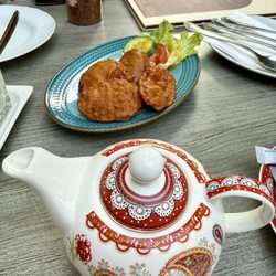 Indian Palace Restaurant - Pot of piping hot Masala Chai and Mixed Vegetable Pakora