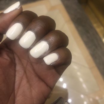 Luxury Nails - Polish all over my hands and spilling over my cuticles. - Waxing Near Me - Washington, DC, District of Columbia