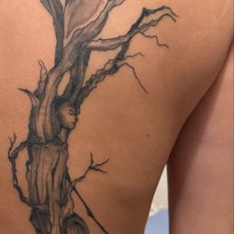 The face prior to me asking him to cover it up because it lacked proportionality and detail which did not match with the rest of the tree The face prior to me asking him to cover it up because it lacked proportionality and detail which did not match with the rest of the tree