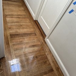 Cruz Hardwood Flooring - This hallway I also had refinished. Ishmael and team did a great job of matching wood grains and boarders to make the house flow seemlessly