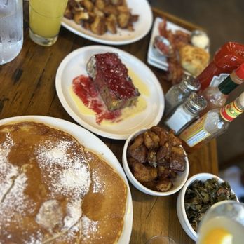 Four Friends Kitchen - Scratch Pancakes bread pudding, potatoes, collard greens, crab cake Crab and Fried Green Tomato Benedict - Southern Near Me - Denver, Colorado