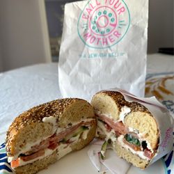 Bagel, lox, and cream cheese on an everything bagel.