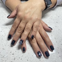 Halloween Matte Black nails with freehand designs