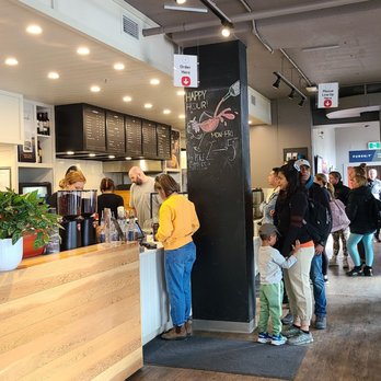 Good Earth Coffeehouse - customers at the counter - Cafes Near Me - Banff, Alberta