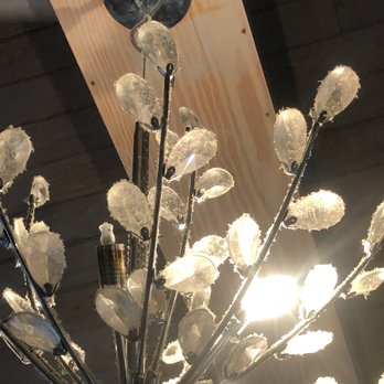 Treasure Realty - Chandelier above kitchen table - Property Management Near Me