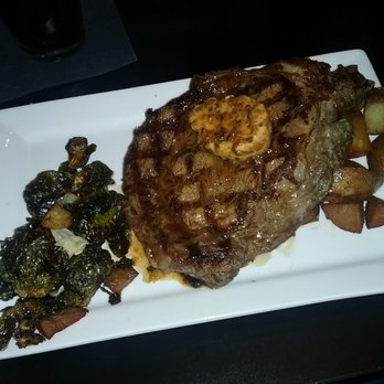 Bar Bistro - Wonderful steak with butter on top. - Cocktail Bars Near Me - Tacoma, Washington