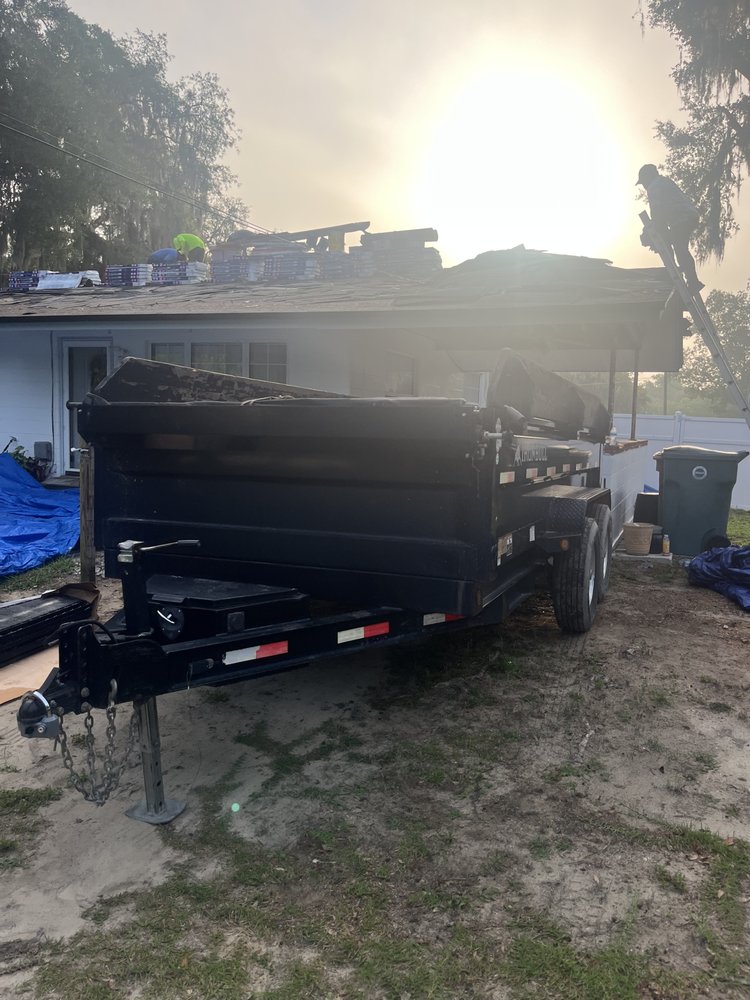 Slide of Big Jon Dumpster Services