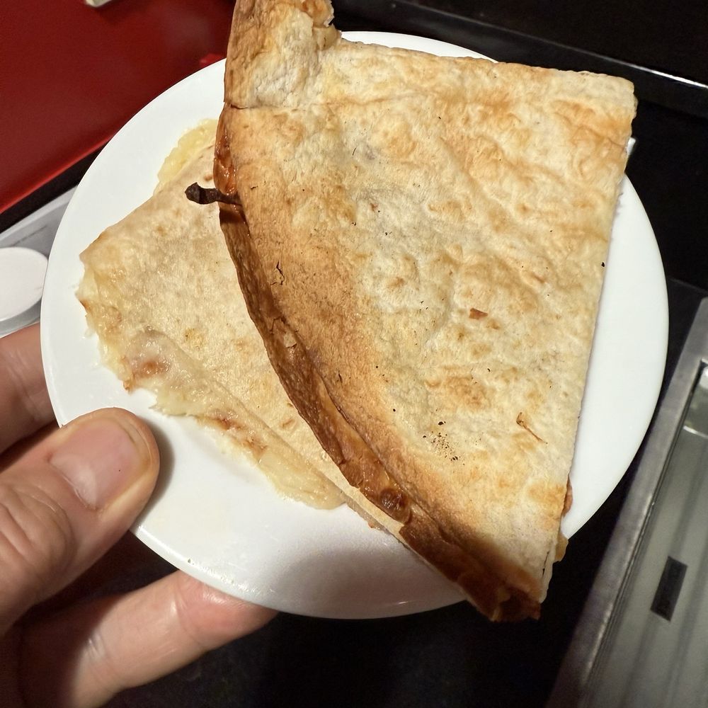$17.94 for this two piece Cheese Quesadilla. Rip-off! $17.94 for this two piece Cheese Quesadilla. Rip-off!