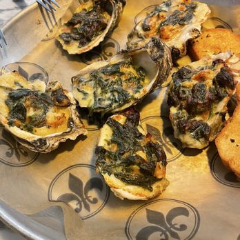 Cajun Flames - Half shell rockafellar oyster - Seafood Near Me - New Orleans, Louisiana