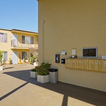 Molino Apartments - Front entrance - Apartments Near Me - Long Beach, California Molino Apartments - Front entrance - Apartments Near Me - Long Beach, California