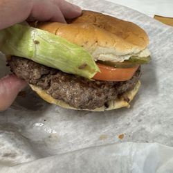 Closeup of the burger patty. It has to be 1/2 a pound of beef.