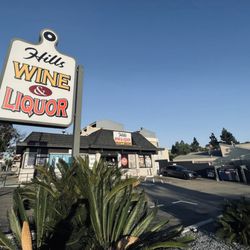 Hills Wine & Spirits - The storefront and parking lot