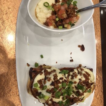 Another Broken Egg Cafe - Eggs Benedict with tomatoes and a side of city grits - Breakfast & Brunch Near Me - Winter Park, Florida Another Broken Egg Cafe - Eggs Benedict with tomatoes and a side of city grits - Breakfast & Brunch Near Me - Winter Park, Florida