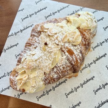 Sweet Bee Bakehouse - Almond raspberry croissant ($6)-- not much raspberry flavor but pretty - Custom Cakes Near Me - Pearland, Texas Sweet Bee Bakehouse - Almond raspberry croissant ($6)-- not much raspberry flavor but pretty - Custom Cakes Near Me - Pearland, Texas