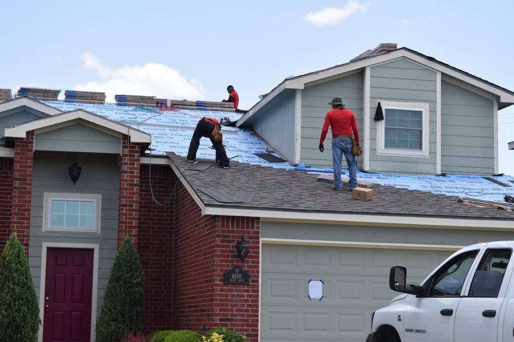 Slide of Top Notch Roofing