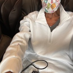 Sitting in one of the very nice massage chairs