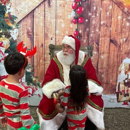 Love this candid shot Greg took with the Photobooth of kids interacting with Santa.