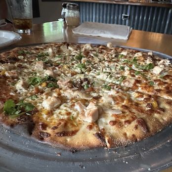 Riverwest Pizza - 14" - Call Me Daddy" - White Sauce, fire roasted corn, chicken, topped with cilantro, Parmesan, generous hot honey drizzle - Pizza Near Me - Milwaukee, Wisconsin