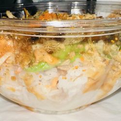 Side view of completely yet untouched 3 protein poke bowl