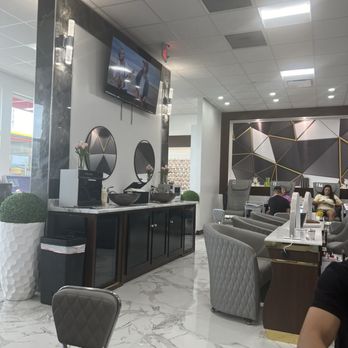 Fashion Nail Spa - Manicure chairs and tables, hand washing sinks, fridge with water bottles and a TV with elevator style "American" music. - Nail Salons Near Me - Indianapolis, Indiana