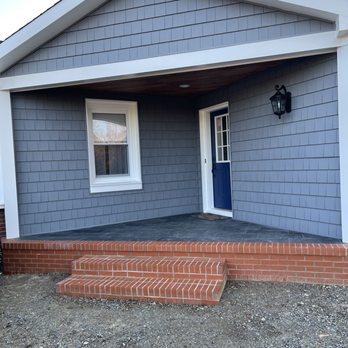 Sturdevant Construction - Removed a small 3 step entranceway and built out the porch, adding siding and recessed lighting in stained beadboard top. - General Contractors Near Me - Newport News, Virginia