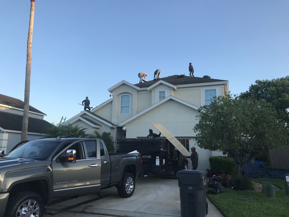 Slide of Schick Roofing