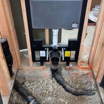 JBS Plumbing Solutions - Wall mount toilet carrier installation - Plumbing Near Me