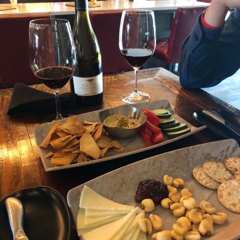 Cellar44 - Hummus plate, Manchengo plate and bottle of wine. - Wine Bars Near Me - Omaha, Nebraska