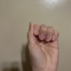2Ns Nails & Spa - Other hand of thinned out nails due to acrylic removal.