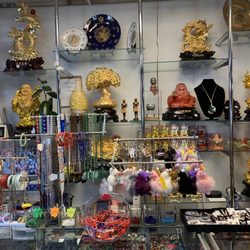 Bamboo Boutique and Gifts - Key rings assortment. Jewelry gold rings, necklaces assorted.