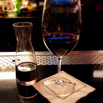 Morton's The Steakhouse - a glass of wine and a decanter - Steakhouses Near Me - Pittsburgh, Pennsylvania